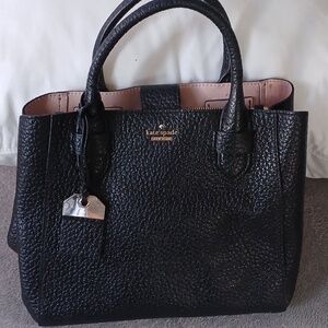 A black Kate Spade handbag